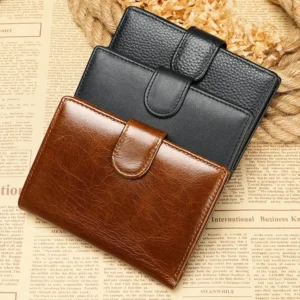 Brown and black leather bifold wallets with snap closure