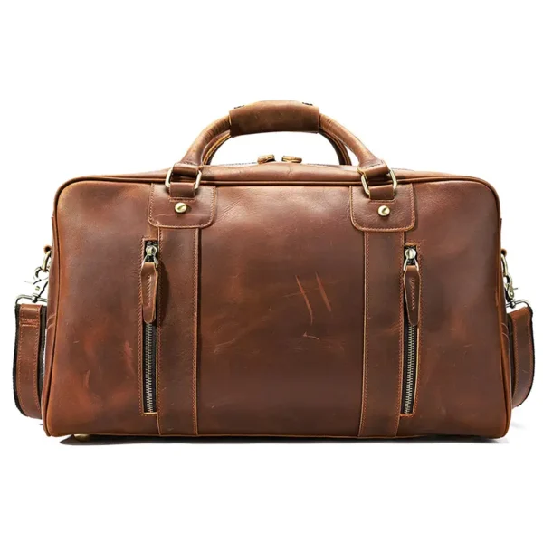 1 (10) Vintage brown leather duffle bag with multiple compartments, plain background