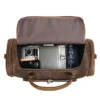 1 (11) Open vintage brown leather duffle bag showing interior compartments