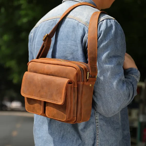1 (13) Man wearing brown leather crossbody bag, casual daily use
