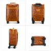 1 (14) Man pulling warm brown leather trolley luggage, outdoor street style