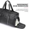 1 (19) Black leather duffle bag with independent shoe compartment, product demo shot