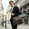 1 (19) Brown leather duffle bag open view, showing interior compartments