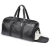 1 (2) Black leather compact travel duffle bag, studio shot