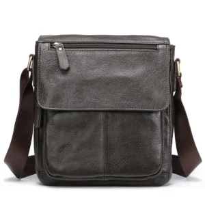 Classic brown leather messenger bag with distressed texture, plain background