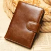 Rustic brown leather wallet on textured natural background