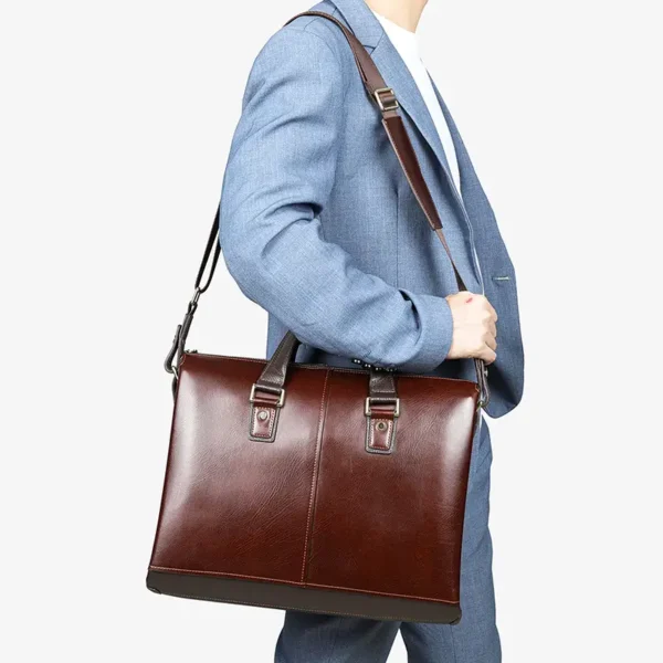 Man wearing brown leather briefcase, over the shoulder style