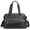 1 (5) Black leather structured duffle bag with multiple pockets, studio shot