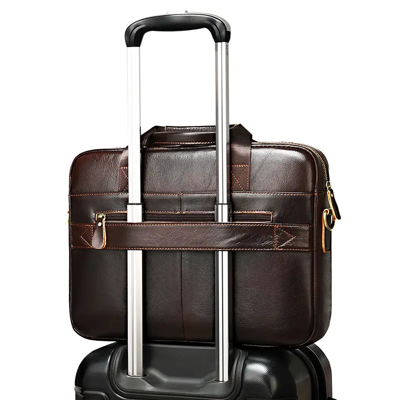 Brown leather briefcase with trolley sleeve, travel product shot