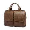 8002 (21) Vintage brown leather briefcase, white background