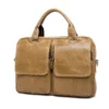8002 (24) Tan brown leather briefcase with double front pockets, studio shot