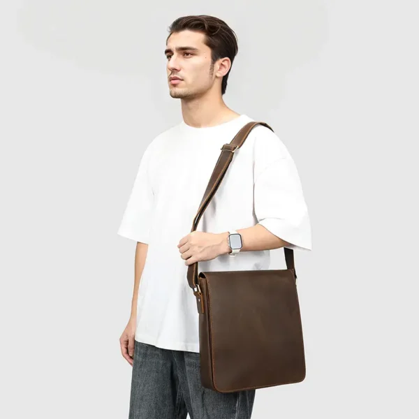 ai Young man carrying brown leather crossbody bag, casual style