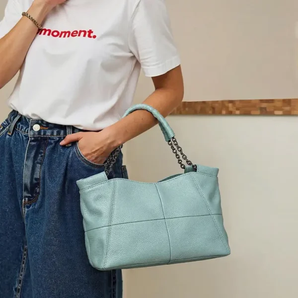 ai3 Light blue leather handbag 4-angle collage, front/side views