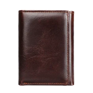 Vintage dark brown leather bifold wallet, professional studio shot