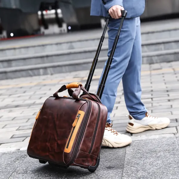咖啡 (12) Man pulling brown leather duffle bag with trolley sleeve, casual street style