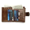 Open brown leather wallet with cash, cards and multiple compartments