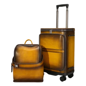 Vintage brown leather luggage set with duffle and trolley bag, plain background