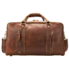 Classic brown leather travel duffle bag, studio shot