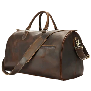 Classic brown leather travel duffle bag with side pockets, studio shot