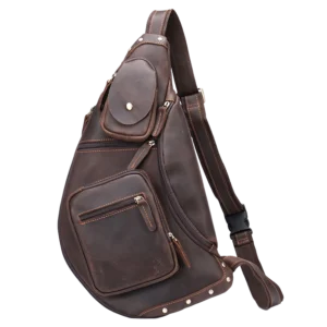 Vintage brown leather sling backpack, studio shot