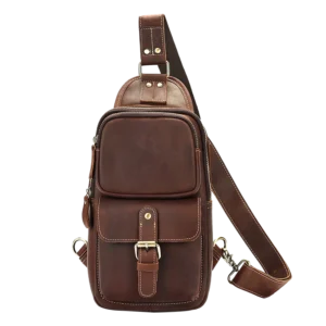 Vintage brown leather sling backpack, studio shot