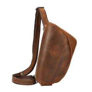 Classic brown leather sling bag, studio shot