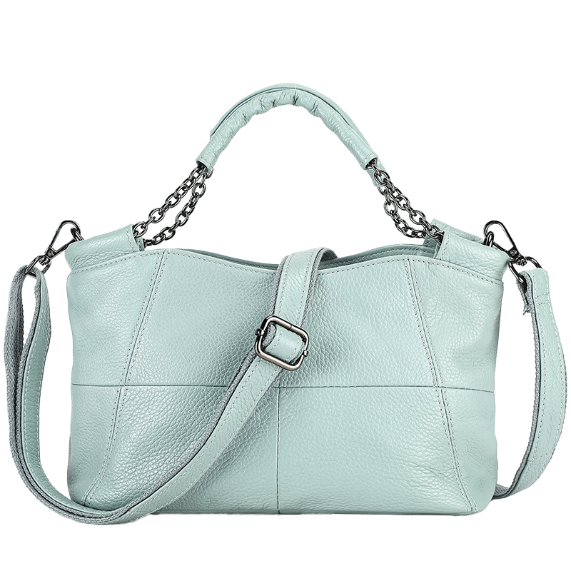 Vintage light blue leather hobo bag, studio shot
