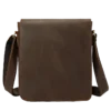 首图 Brown leather crossbody bag, plain studio background