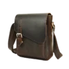 首图 Classic brown leather messenger bag, studio shot