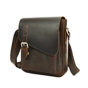 Classic brown leather messenger bag, studio shot