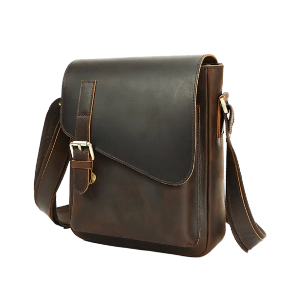 首图 Classic brown leather messenger bag, studio shot