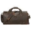 首图 Vintage brown leather duffle bag with buckle closure, studio shot