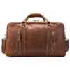 首图白底 Vintage brown leather duffle bag with buckle closure, white background