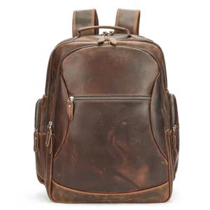 Brown leather backpack with multiple compartments, plain background