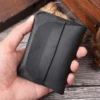 Black Crazy Horse leather card holder wallet 7386 shown in hand