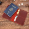 Red PH-101 leather passport holder opened to show passport sleeves and card slots