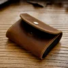 Brown PK-127 leather card holder showing snap flap and stitched edges