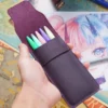 Purple T03 leather pen pouch holding five pens