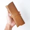 Brown Crazy Horse leather pen pouch T31 shown in hand