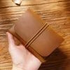 Wholesale Crazy Horse leather passport holder PH-106 brown closed view with elastic band
