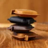 Wholesale Crazy Horse leather retractable tape measure PC-006 stacked side profile showing compact thickness