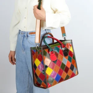 woman carrying multi coloured cowhide tote bag style 10661 by shoulder