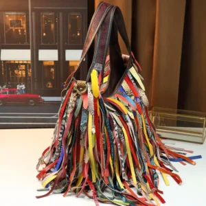 colorful cowhide hobo bag style 588 side view with long fringe
