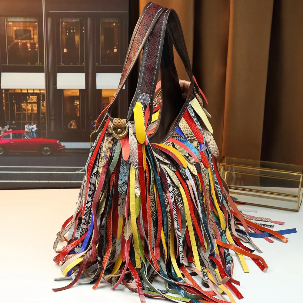 colorful cowhide hobo bag style 588 side view with long fringe