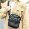 black cowhide crossbody sling bag 6190 lifestyle view