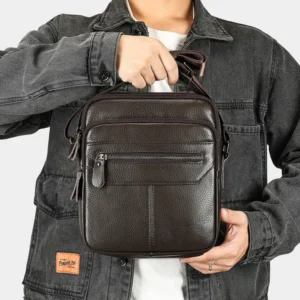 coffee crossbody bag style 6191 carried by top handle