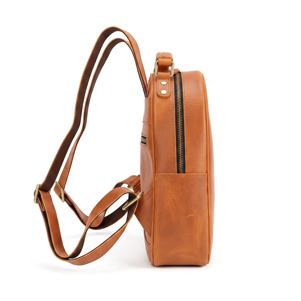 Wholesale Crazy Horse leather women's backpack 7823 brown side view with zip closure and adjustable straps