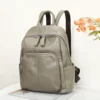 Leather women's multi-pocket backpack N7816 gray front view for wholesale buyers