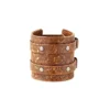 Leather wristband wallet worn on the wrist