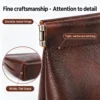 Cowhide coin purse style Q8086 with metal hinge reinforced stitching and flat base